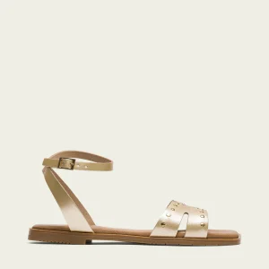 SANDALE PLATE EN CUIR AVEC CLOUS DORÉS VIKA